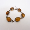 Foto 1: Art Deco Armband-Kette, mit Bernsteinen, 835er Silber