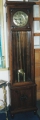 Standuhr, um 1920, in Eiche