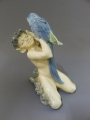 Christian Thomsen (1860-1921): Porzellanplastik - Faun mit Papagei, Entwurf um 1900, Ausführung um 1923 von Königliche Porcelainsfabrik Kopenhagen